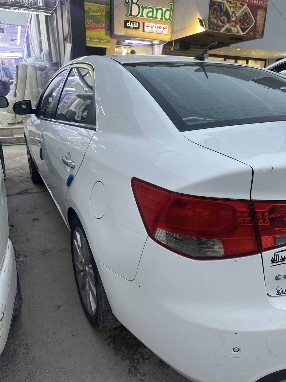 كيا سيراتو 2012 

خليجي بدون حادث فقط البنيد مطخوخ و مصلح 
السيارة مكفوله كير محرك و صدر جديد و كلشي نضيف و مابيه اي نقص مثل ممبينه بصور مكاني بغداد حي العامل سعر 100 

رقمي : ***********
