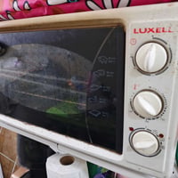 اوفن ومكوى ملابس ب 50 الف وبي مجال الاتصال 07707855478