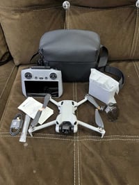 DJI MINI 4 PRO كومبو جديد فقط مفحوص جديد لوك 3 بطاريات مكان بغداد العب...