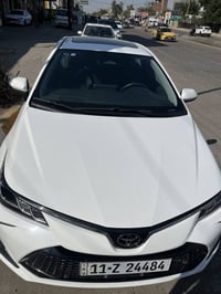 كورلا هايبرد 2024 مكفوله صبغ وباردوتبديل  ماشيه 18300 مواصفات معروفه م...