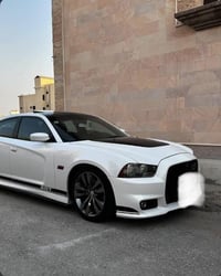 جارجر Rt 2014 للبيع السياره جديده جداا جداا الممشى 76km داخل جلد فتحه ...