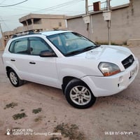 توكسان 2009  قطعتين بلادي  سيارة جاهزة وجديده  وكاله بسمي  تبريد تاير ...