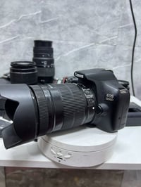 كامره كانون 1300 عدسه 135-18  رام 16  كيبل نقل صور   شاحنه بطاريه   كا...