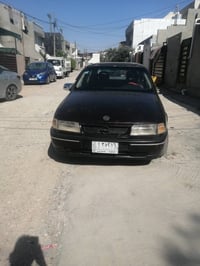 موديل ١٩٩٠ • محرك ٢.٠ • سقف سلايت