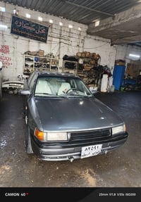 مازدا 323 • تكييف بارد وساخن • رقم أربيل