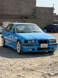 bmw1992 e36 للبيع رقم بغداد انكليزي باسمي تحويل ثاني يوم🥇 السيارة بدون...
