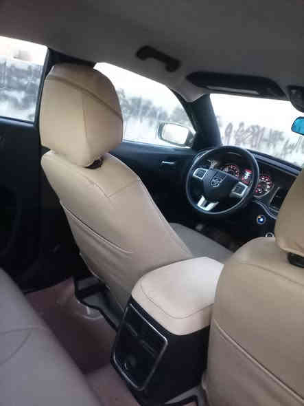 جارجر2012تكسي بسمي رقم دولي كيرمكينه جديدقبل سبوع صبغه جديدة تخم تاير حداديه ***********مكان سيارة لعمارة سعر155وبيهه مجال
