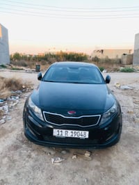 كيا أوبتيما موديل 12رقم بغداد إنكليزي وارد امريكي حادثها جاملغ امامي ب...