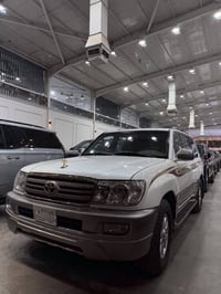 لاندكروز مونيكا  رقم بغداد تحويل مباشر  موديل 2000  السياره صبغ حزام ج...