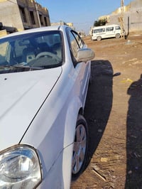 اوبترا موديل 2011 بيهه مكينه حاويه قبل كم يوم شاديهه سياره حلوه وجاهزه...