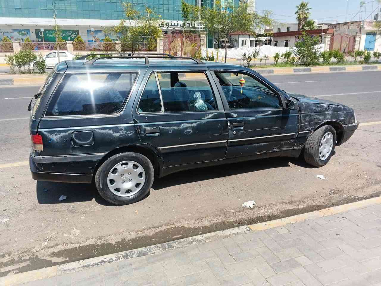 بيجو 405 مكينه بيها بدايه نفخ وايرمنيه شغاله سياره بدون صبغ بها تقحيم بيها تخيل كربون مال تخومه تعبان سياره شغاله شرط الوكاله.    ***********.     سعر 11
