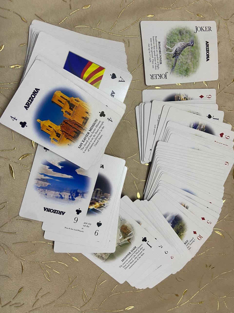 بعيد عن التلفونات،،ورق لعب بهذا الشكل كلش حلو كل ورقه مرسومه ومشروح عليها معلم من معالم ولايه ازيزونا الامريكيه
 مكاني موصل ***********
