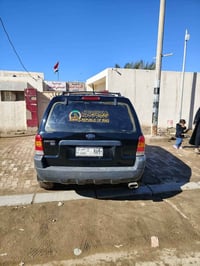 فورد سكيب 2004رقم نجف بسم شركه الهرموش مامطلوبه ربع اني ابيع بدون تحوي...