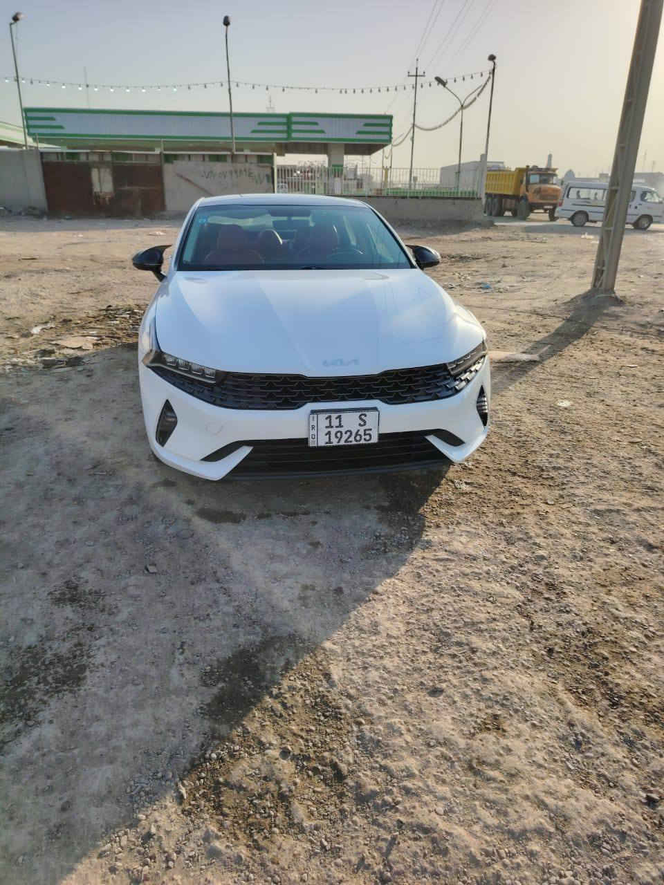 #للبيع_فقط كيا k5 موديل 2023 ماشيه 70الف حقيقي شرط الفحص  السياره مكفوله كفاله عامه من الشخط او الرصعه فول مواصفات للخير  مكينه 2000 مكان السياره بغداد اقواس بغداد السعر 225 مع المجال للستفس‏‪***********‬‏
