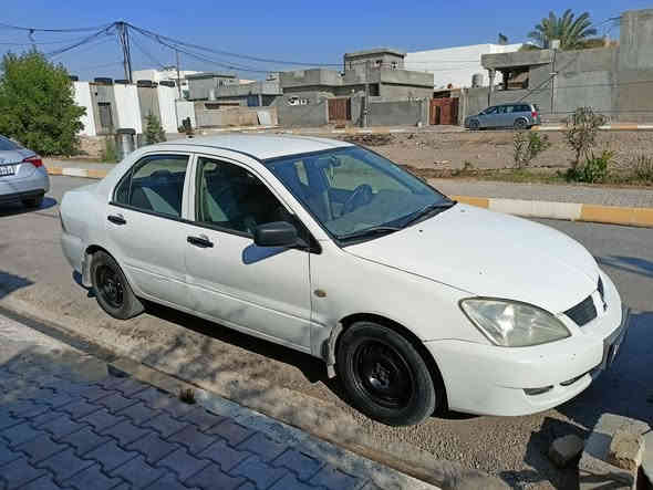 للبيع لانسر  موديل 2007  محرك 20  رقم سليمانية  شرط التحويل
 بسمنا  حتى بيها لاصق بانزين 
وهزة مالته لغاية شهر 2/ 2026  يعني ماتحتاج هزة كبل تحويل     مكان السيارة  كلار   بشرط بدون اي نقص جاهزة على اخر حبة ماشاء الله 
* كير محرك بشرط لوك 
* تبريد ثلج 
•تدفئة 
* كهربائيات  كله شغال 
* غرفتها على وضع الشركة 
* كاعية جلد سهلة التنظيف 
* صدر امامي و خلفي جديد 
* قفل مركزي 
تايرات جديدة
* تخم دسكات جديد 
السعر... 72 وبيه  مجال
***********
