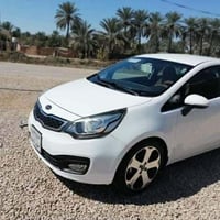 كيا ريو مديل 2013 مكفوله من صبغ وتبديل وضربه مكينه كير كهربائيات حدادي...