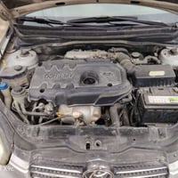 اكست 2009 لون سلفر محرك  بديت نفخ وكير شرط كير عادي محرك 14 رقم جديد ا...