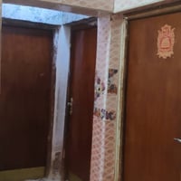 بيت 200متر +مشتمل 100متر +قطعه 80متر مسيجه ركن من ظمن النواب الظباط حي...