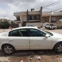 نيسان التما للبيع موديل ٢٠٠٦ باسمي مكينه وكير وتبريد مكفولات عنواني بغ...