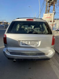 دودج كرفان 2007 السيارة 7 راكب كشنات منفصل وبلع ايضاً  مكينتها 3300 ال...