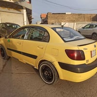 كيا ريو ( كير عادي ) موديل 2010 رقم نينوى  الماني كابون بأنزين  وارد ك...