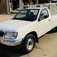 نيسان موديل 2002 رقم بغداد مصبوغه عام لجمليه شواصي مكفوله كير محرك خير...