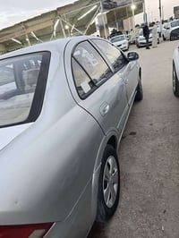 نيسان سني 2012 رقم نجف بيها جراد بسيط مكفوله جاهزا من كلشي السعر 95 بي...