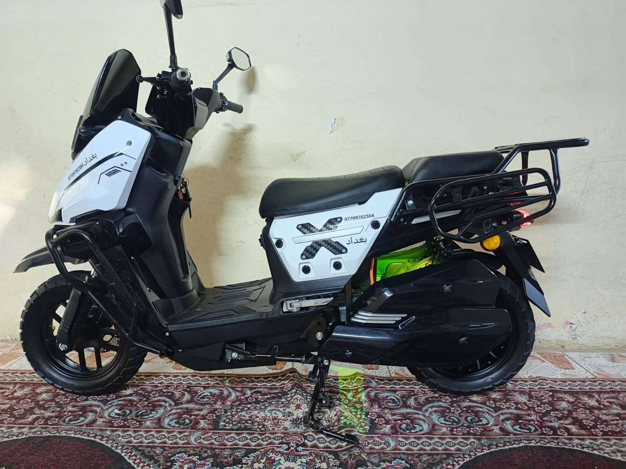 السلام عليكم للبيع دراجه اباجي مديل 2026 دراجه جديده بمعنه الكلمه مكفوله كفاله عامه مكفوله من الشخط كامله مكمله من كلشي صار شهر اونص من ماخذها بعده جيس الشركه بيها انت شيله بيدك تجي فول مواصفات وصل المعرض او ملحقاتها بيها
تفاصيل الدراجه 
لايت عللي ناصي زنون 
بجم لد + نشرات ترحيب
اشاير جانبيه لد متغيه الاوان
دبل اشاره 
شاشه ذكيه تكشف عطل الدراجه ولتنبيهات
بلوتوث + سستم صوت لمس بل شاشه
بريك امامي خلفي دسك هايدروليك 
حساس بريك امامي خلفي
نضام بك الرجوع الى الخلف 
مثبت سرعه
بك لايت خلفي لد
دبلات امامي خلفي غاز
تايرات جلاتين جبلي الحجم الكبير 
ويل كب 
درع امامي خلفي لحمايه الدراجه
طلاعات جابنبه لراكب الخلفي 
ملف الدراجه 3000 حقيقي 
عدد البطاريات 6 مصطره الحجم الكبير
تقطع مسافه بل شحنه الوحده 80 كيلو
السرعه الحقيقيه 150
شاحنه ذكيه تدعم الشحن السريع وليقاف الذاتي عند امتلاء البطاريه
الشراي يتفضل خاص او التصال عله الرقم ***********
سعر الدراجه 1250 اوبي مجال بصيط
مكان الدراجه بغداد المنصور
