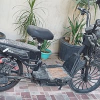 دراجة شحن 3 بطاريات جديده اصليات تاير جديد بعدني مشاده عليه  يحتاجله ت...