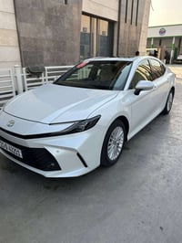 كامري موديل ٢٠٢٥شركه ساز رقم بغداد بانزين فقط بيه طخه خفيفه بل ٤اصابع ...