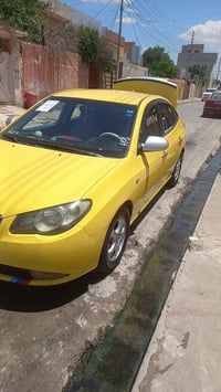 افنتي موديل 2010  رقم نينوى دولي بيها كاربون وبيها منظومة غاز كرت حكوم...