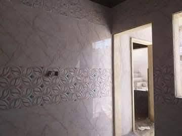 تركيب سيراميك وجدران وارضيه سعر مناسب سكني موصل اشتغل خارج ***********
