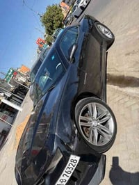 كمارو ٢٠١٥ فئة RS بيها الجاملغ الامامي صبغ حادث امريكا وقطعتين كلير بس...