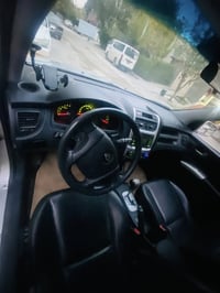 كيا سبورتاج • غاز • کەلار