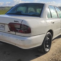 پرۆتۆن ئارم • ٢٠٠٢ • شمشمل