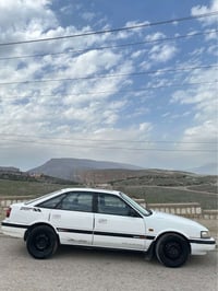 مازدا ١٩٩٠ • ٣٣٠٠٠ كم • رقم اربيل