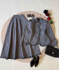 طقم ملابس • النجف