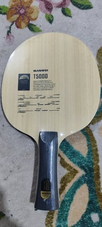 مضرب كاربون • عدة طبقات • مع الجنطة