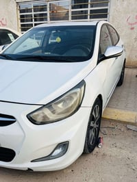 اكسنت • ٢٠١٤ • رقم بغداد