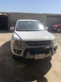 سلام وعليكم سبورتج 2010كوري فول مواصفات  سيارة مكينة ٢٠٠٠ دوش مكينة كي...