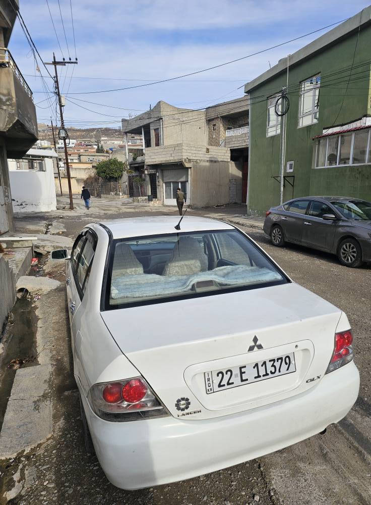 #لانسەر 2007 مەکینە گەورەی تۆماتیک
دوو پارچەی پێشەوە بێ داخلی 
گێر و مەکیـنە بەشەرت
سەنەوی تا 2024 نوێیە
ژ.خاوەن:    ***********
