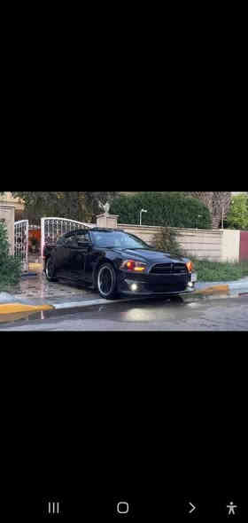 جارجر 2014  ار تي  فول  مواصفات لأخير  حادث جاملغ جهت السايق  بدون ايرباك او لغد او شاصي  السياره فول تزود من هوائيات وشوته رياضي وبنيد ابو الفتحه،? المكان بغداد الرقم ***********  رقم  بغداد تحويل مبآشر السعر 150$ وبيها مجال السياره نظيفه بدون اي نقص بغداد
