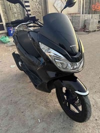 هوندا • PCX • دراجة هوندا • هوندا بي سي اكس • دراجة يابانية • سكوتر هو...