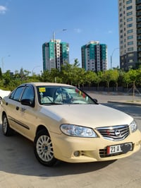 Nissan sunny 2012 taxi گێڕ و مەکینە و تەبرید و کامل کارەبایی بە شەرت ٤...