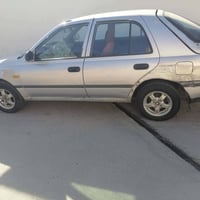 نيسان صني • محرك يدخن باردة • تايرات وباتري جديدة