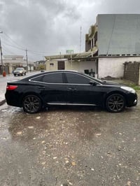 اخوان مكلف بالنشر  سيارة ازيرا 2014 خليجي فووول ليمتد للبيع  السعر 135...