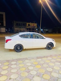 نيسان سني 2022 بليته زركه  رقم اربيل تنتهي 2027 /3  سيارة جاهزه وحلوه ...