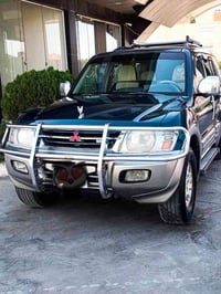 باجيرو موديل ٢٠٠٢  فول ماعد فتحه تبريت مركزى محرك كير فور ويل كل بشرط ...