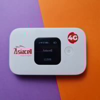 عندي جهازين واي فاي اسيا سيل البيع مثل الي بالصورة مع الكرتون لواحد من...