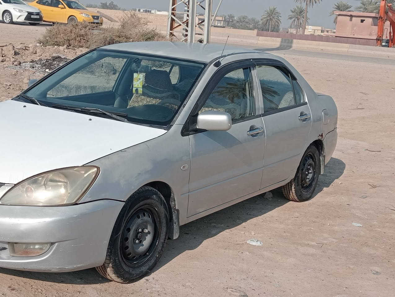 السلام عليكم لانسر موديل 2006رقم بغداد كير ومحرك مكفولات تبريد تلج حجم المحرك 2000 السعر 55ورقة مكاني بغداد رقم الموبايل ***********
